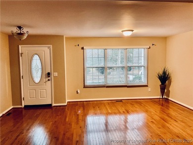 NEW PRICE/NEW PAINT AND CARPET/THIS HOME IS PRICED BELOW TAX on Carolina Trace Country Club in North Carolina - for sale on GolfHomes.com, golf home, golf lot