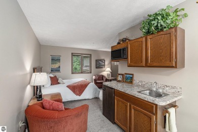 Pride of ownership shines throughout this original owner turnkey on Crystal Mountain Golf Course in Michigan - for sale on GolfHomes.com, golf home, golf lot