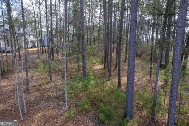 Situated along the highly sought-after Richland golf course at on Reynolds Lake Oconee - The Oconee in Georgia - for sale on GolfHomes.com, golf home, golf lot