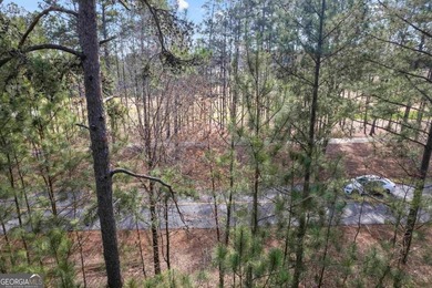 Situated along the highly sought-after Richland golf course at on Reynolds Lake Oconee - The Oconee in Georgia - for sale on GolfHomes.com, golf home, golf lot