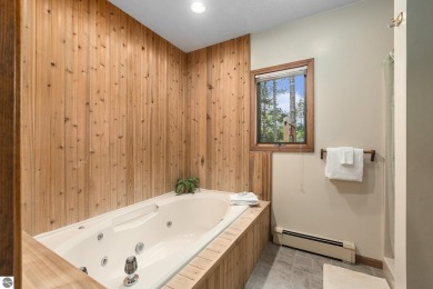 Pride of ownership shines throughout this original owner turnkey on Crystal Mountain Golf Course in Michigan - for sale on GolfHomes.com, golf home, golf lot