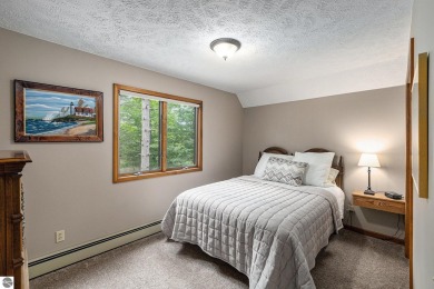 Pride of ownership shines throughout this original owner turnkey on Crystal Mountain Golf Course in Michigan - for sale on GolfHomes.com, golf home, golf lot