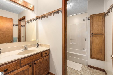 Pride of ownership shines throughout this original owner turnkey on Crystal Mountain Golf Course in Michigan - for sale on GolfHomes.com, golf home, golf lot