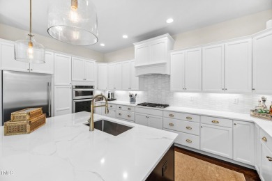 Welcome to this impeccably designed home in the sought-after on Hasentree Club in North Carolina - for sale on GolfHomes.com, golf home, golf lot