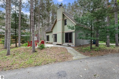 Pride of ownership shines throughout this original owner turnkey on Crystal Mountain Golf Course in Michigan - for sale on GolfHomes.com, golf home, golf lot