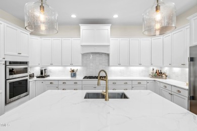 Welcome to this impeccably designed home in the sought-after on Hasentree Club in North Carolina - for sale on GolfHomes.com, golf home, golf lot