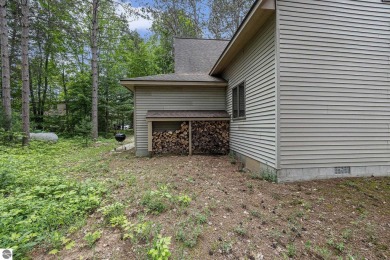 Pride of ownership shines throughout this original owner turnkey on Crystal Mountain Golf Course in Michigan - for sale on GolfHomes.com, golf home, golf lot