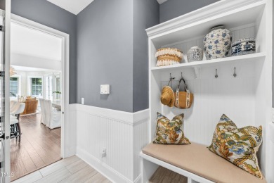 Welcome to this impeccably designed home in the sought-after on Hasentree Club in North Carolina - for sale on GolfHomes.com, golf home, golf lot