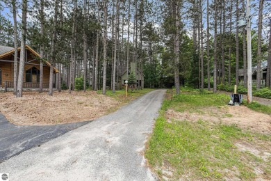 Pride of ownership shines throughout this original owner turnkey on Crystal Mountain Golf Course in Michigan - for sale on GolfHomes.com, golf home, golf lot