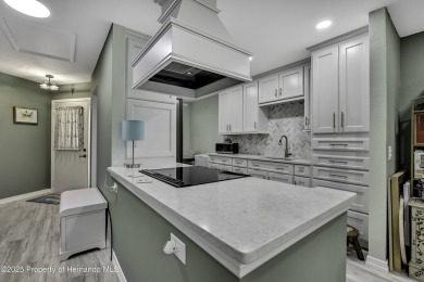 Discover this beautifully updated villa in the award-winning on Timber Pines Golf Course in Florida - for sale on GolfHomes.com, golf home, golf lot