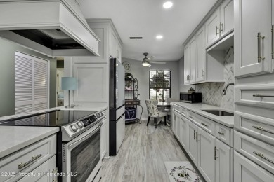 Discover this beautifully updated villa in the award-winning on Timber Pines Golf Course in Florida - for sale on GolfHomes.com, golf home, golf lot