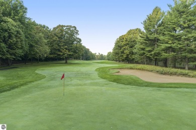 Pride of ownership shines throughout this original owner turnkey on Crystal Mountain Golf Course in Michigan - for sale on GolfHomes.com, golf home, golf lot
