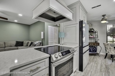 Discover this beautifully updated villa in the award-winning on Timber Pines Golf Course in Florida - for sale on GolfHomes.com, golf home, golf lot
