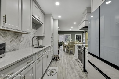 Discover this beautifully updated villa in the award-winning on Timber Pines Golf Course in Florida - for sale on GolfHomes.com, golf home, golf lot