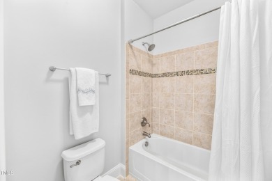 Welcome to this impeccably designed home in the sought-after on Hasentree Club in North Carolina - for sale on GolfHomes.com, golf home, golf lot
