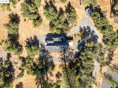 Location, location, location! Beautiful mid-century modern on Pine Mountain Lake Country Club in California - for sale on GolfHomes.com, golf home, golf lot