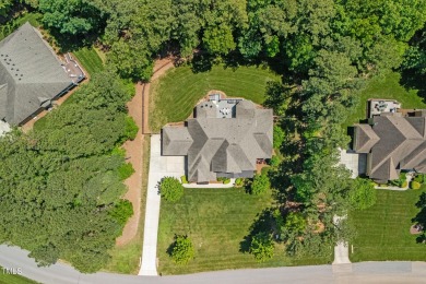 Welcome to this impeccably designed home in the sought-after on Hasentree Club in North Carolina - for sale on GolfHomes.com, golf home, golf lot