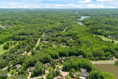 Welcome to this impeccably designed home in the sought-after on Hasentree Club in North Carolina - for sale on GolfHomes.com, golf home, golf lot