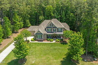 Welcome to this impeccably designed home in the sought-after on Hasentree Club in North Carolina - for sale on GolfHomes.com, golf home, golf lot