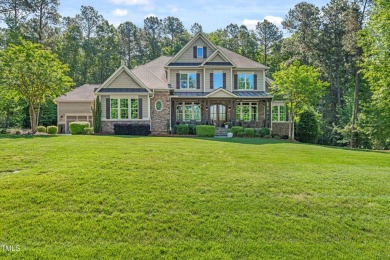 Welcome to this impeccably designed home in the sought-after on Hasentree Club in North Carolina - for sale on GolfHomes.com, golf home, golf lot