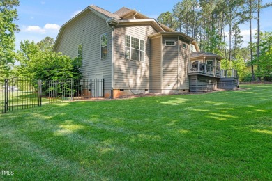Welcome to this impeccably designed home in the sought-after on Hasentree Club in North Carolina - for sale on GolfHomes.com, golf home, golf lot