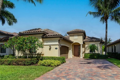 This open floor plan is light and bright with 2 bedrooms plus a on The Golf Club At Fiddlers Creek in Florida - for sale on GolfHomes.com, golf home, golf lot