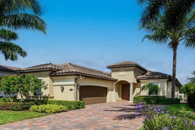 This open floor plan is light and bright with 2 bedrooms plus a on The Golf Club At Fiddlers Creek in Florida - for sale on GolfHomes.com, golf home, golf lot