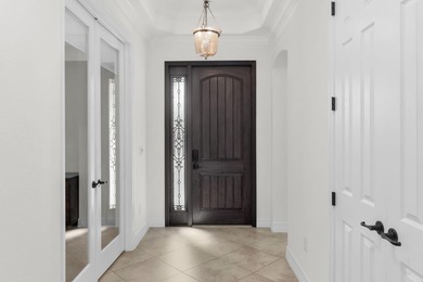 This open floor plan is light and bright with 2 bedrooms plus a on The Golf Club At Fiddlers Creek in Florida - for sale on GolfHomes.com, golf home, golf lot