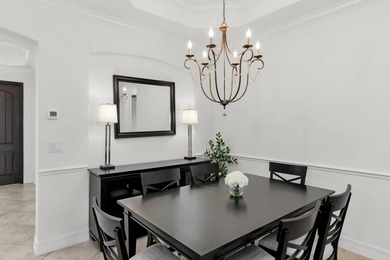 This open floor plan is light and bright with 2 bedrooms plus a on The Golf Club At Fiddlers Creek in Florida - for sale on GolfHomes.com, golf home, golf lot