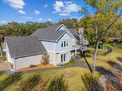 This beautiful home features wide porches and wrap-around on Idabel Country Club in Oklahoma - for sale on GolfHomes.com, golf home, golf lot