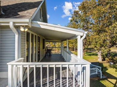 This beautiful home features wide porches and wrap-around on Idabel Country Club in Oklahoma - for sale on GolfHomes.com, golf home, golf lot