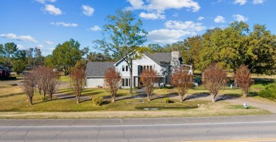 This beautiful home features wide porches and wrap-around on Idabel Country Club in Oklahoma - for sale on GolfHomes.com, golf home, golf lot