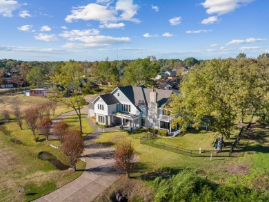 This beautiful home features wide porches and wrap-around on Idabel Country Club in Oklahoma - for sale on GolfHomes.com, golf home, golf lot