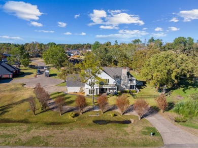 This beautiful home features wide porches and wrap-around on Idabel Country Club in Oklahoma - for sale on GolfHomes.com, golf home, golf lot