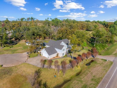 This beautiful home features wide porches and wrap-around on Idabel Country Club in Oklahoma - for sale on GolfHomes.com, golf home, golf lot