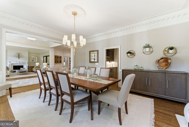 COMMANDING MASSIVE PALATIAL COLUMNS, THIS SUGARLOAF COUNTRY CLUB on TPC At Sugarloaf Golf Club in Georgia - for sale on GolfHomes.com, golf home, golf lot