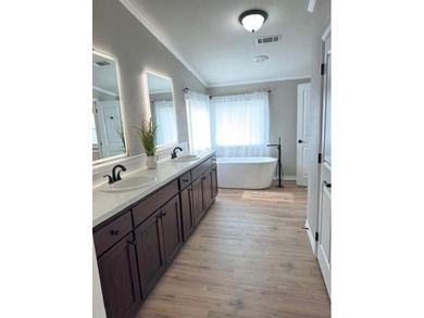 This is a newly remodeled mobile home in Horseshoe Bend Air Park on Horseshoe Bend Country Club in Texas - for sale on GolfHomes.com, golf home, golf lot