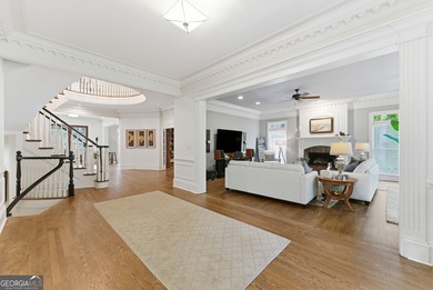 COMMANDING MASSIVE PALATIAL COLUMNS, THIS SUGARLOAF COUNTRY CLUB on TPC At Sugarloaf Golf Club in Georgia - for sale on GolfHomes.com, golf home, golf lot