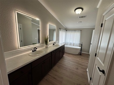 This is a newly remodeled mobile home in Horseshoe Bend Air Park on Horseshoe Bend Country Club in Texas - for sale on GolfHomes.com, golf home, golf lot