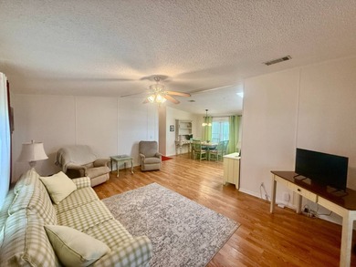 Home is located in Water Oak Country Club Estates in Lady Lake on Water Oak Country Club Estates in Florida - for sale on GolfHomes.com, golf home, golf lot