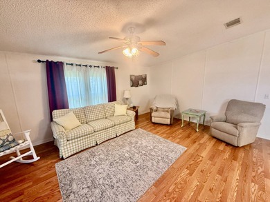 Home is located in Water Oak Country Club Estates in Lady Lake on Water Oak Country Club Estates in Florida - for sale on GolfHomes.com, golf home, golf lot