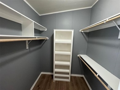 This is a newly remodeled mobile home in Horseshoe Bend Air Park on Horseshoe Bend Country Club in Texas - for sale on GolfHomes.com, golf home, golf lot