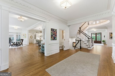 COMMANDING MASSIVE PALATIAL COLUMNS, THIS SUGARLOAF COUNTRY CLUB on TPC At Sugarloaf Golf Club in Georgia - for sale on GolfHomes.com, golf home, golf lot