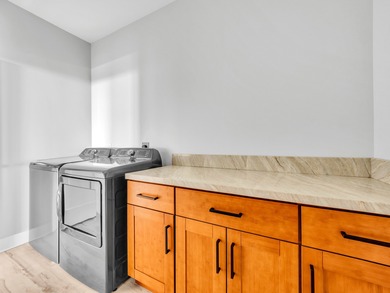 Enjoy expansive coastline and ocean views the moment you enter on Discovery Harbour Golf Course in Hawaii - for sale on GolfHomes.com, golf home, golf lot