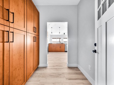 Enjoy expansive coastline and ocean views the moment you enter on Discovery Harbour Golf Course in Hawaii - for sale on GolfHomes.com, golf home, golf lot