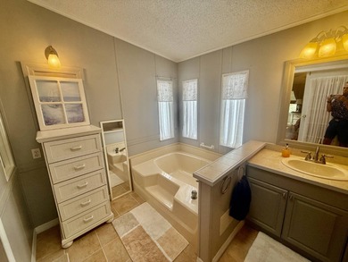 Home is located in Water Oak Country Club Estates in Lady Lake on Water Oak Country Club Estates in Florida - for sale on GolfHomes.com, golf home, golf lot