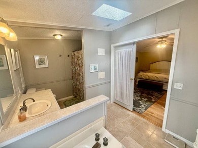 Home is located in Water Oak Country Club Estates in Lady Lake on Water Oak Country Club Estates in Florida - for sale on GolfHomes.com, golf home, golf lot