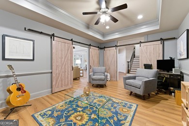 COMMANDING MASSIVE PALATIAL COLUMNS, THIS SUGARLOAF COUNTRY CLUB on TPC At Sugarloaf Golf Club in Georgia - for sale on GolfHomes.com, golf home, golf lot