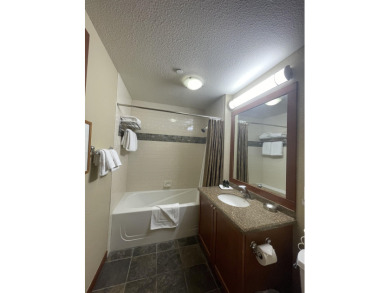 Discover this charming one-bedroom condominium in the Village at on Resort At Squaw Creek in California - for sale on GolfHomes.com, golf home, golf lot