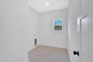 This beautiful two-story home on a full unfinished basement is on The Plantation Golf Club in Georgia - for sale on GolfHomes.com, golf home, golf lot